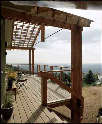 This Trex deck—a composite of recycled plastic and wood fiber—offers stunning views from just outside David Johnston’s home office. The trellis shades the south-facing windows during the summer.
